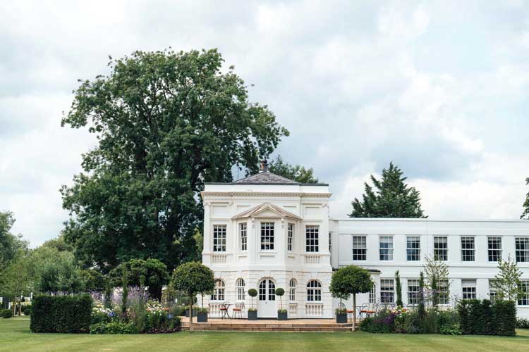 The historic Monkey Island Hotel surrounded by gardens designed by Bradley Burgess Design, Berkshire